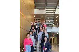 Group photo of graduate students and researchers at the COSMOS mini-conference in April.